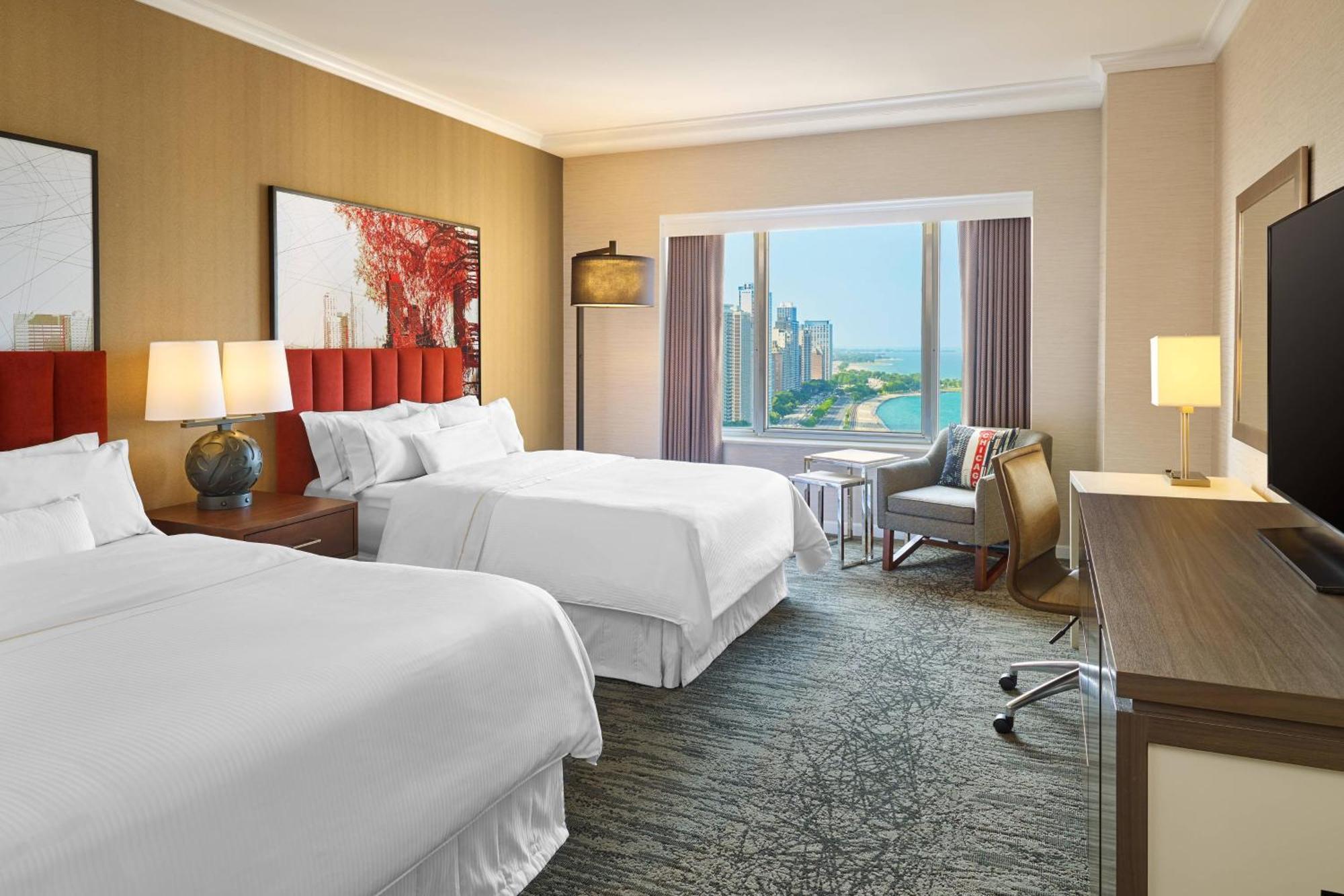 Grand Deluxe Doppelzimmer mit 2 Doppelbetten - teilweiser Seeblick